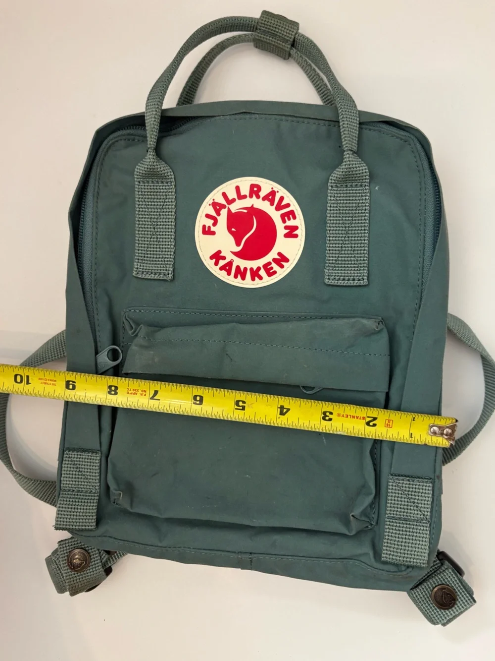 Fjallraven Kanken Mini Backpack in Sage Green with Red Logo